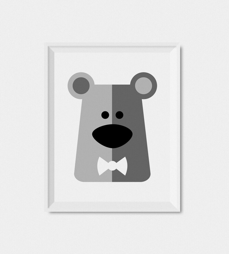 May include: A black and white illustration of a bear wearing a bow tie. The bear is smiling and has a simple design.