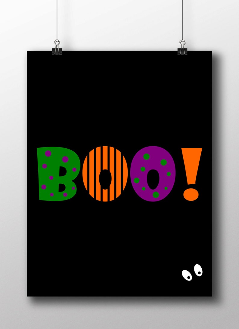 May include: A black background with the word "BOO!" in colorful letters. The letters are decorated with polka dots, stripes, and circles. Two white eyes are peeking out from the bottom of the image.