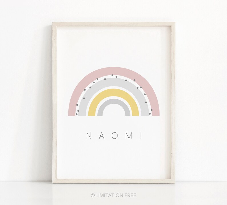 May include: A pink, yellow, and gray rainbow with black polka dots and the name "NAOMI" printed below.