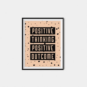 May include: A peach-colored poster with black polka dots and the text "POSITIVE THINKING POSITIVE OUTCOME" in black.