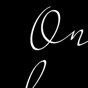 May include: A handwritten cursive script of the word "on" in white on a black background.