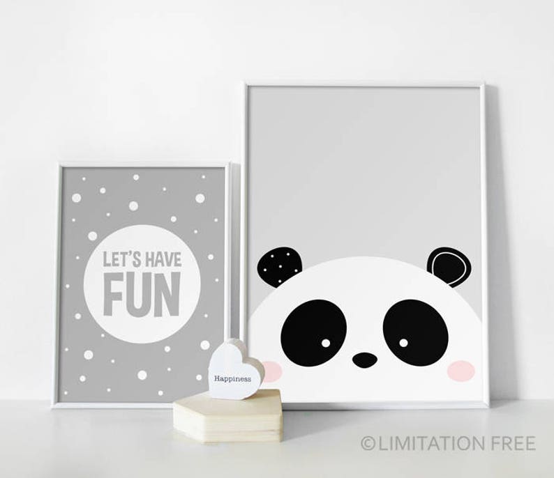 May include: Two framed prints with a grey background. The left print has white polka dots and the text "Let's Have Fun". The right print features a black and white panda face with pink cheeks.