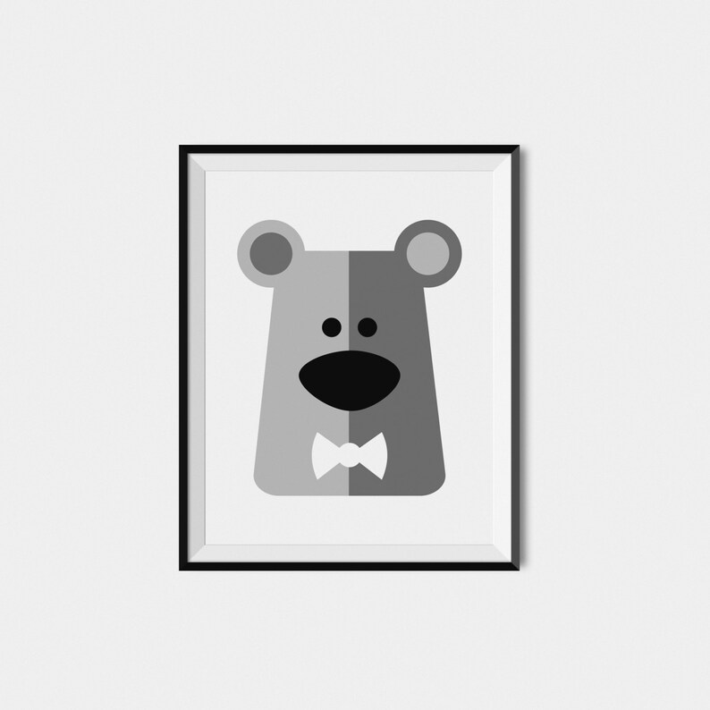 May include: A framed black and white illustration of a bear wearing a bow tie. The bear has a simple, cartoon-like design.