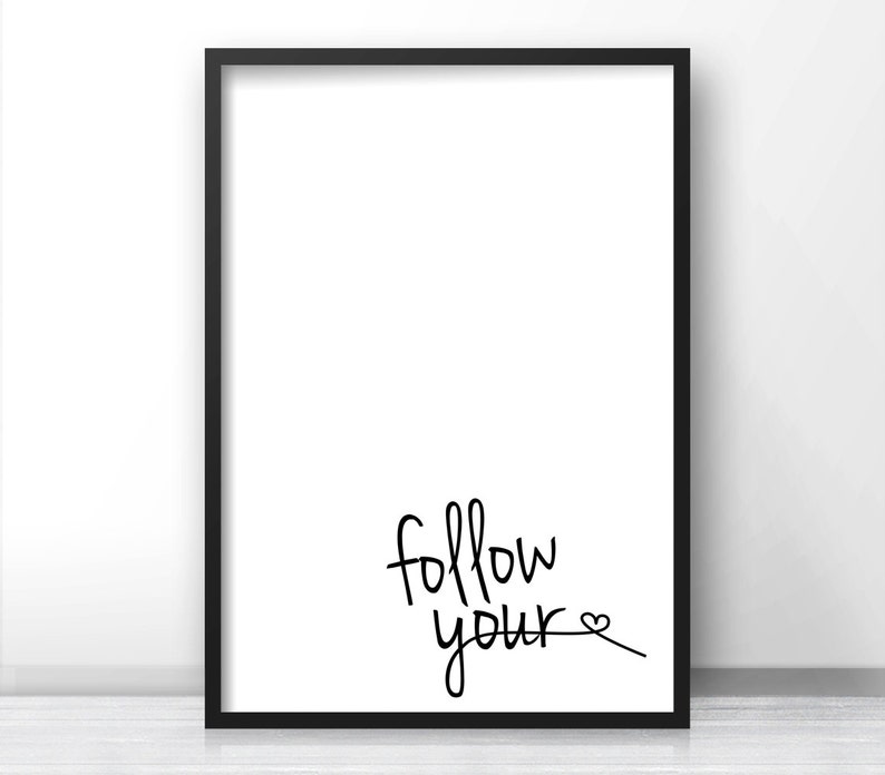 May include: Black and white printable wall art with the text "follow your" and a small heart symbol.