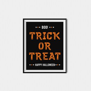 May include: Black and white printable sign with orange text that says "Boo! Trick or Treat Happy Halloween".