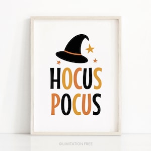 May include: A framed print with a white background features a black witch hat with an orange band and gold stars. The words "HOCUS POCUS" are written in black and orange block letters, perfect for Halloween decor.