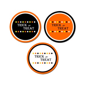 May include: Three round orange and black Halloween stickers with white polka dots and the text "Trick or Treat" in black.