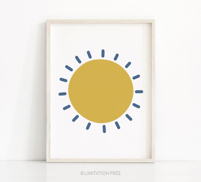 May include: A simple, minimalist print featuring a yellow sun with blue rays. The sun is centered on a white background.