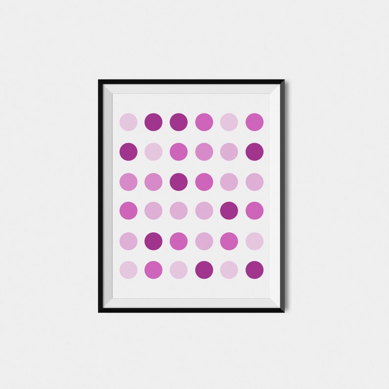 May include: A framed print with a pattern of purple and pink circles on a white background.