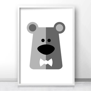 May include: A black and white illustration of a bear wearing a bow tie. The bear is facing forward with a friendly expression. The background is white.