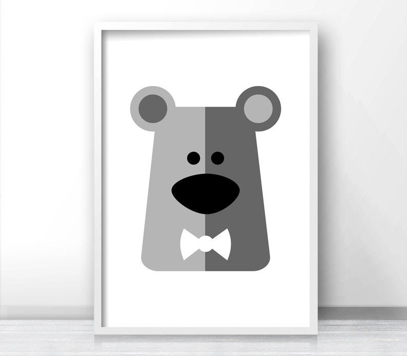 May include: A black and white illustration of a bear wearing a bow tie. The bear is facing forward with a friendly expression. The background is white.