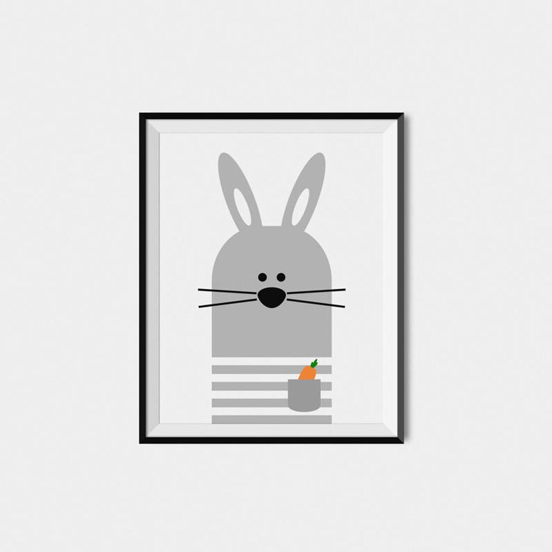 May include: A gray bunny with a carrot in its pocket. The bunny is wearing a striped shirt. The image is in a black frame.
