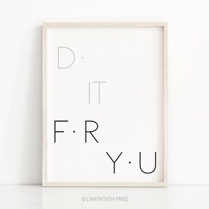 May include: A framed print with the text "D. IT F. R Y. U" in black and gray lettering on a white background.