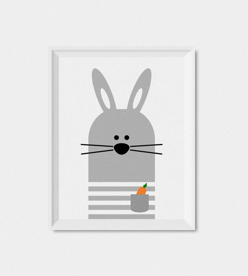 May include: A gray bunny with black eyes and a carrot in its pocket. The bunny is wearing a striped shirt.