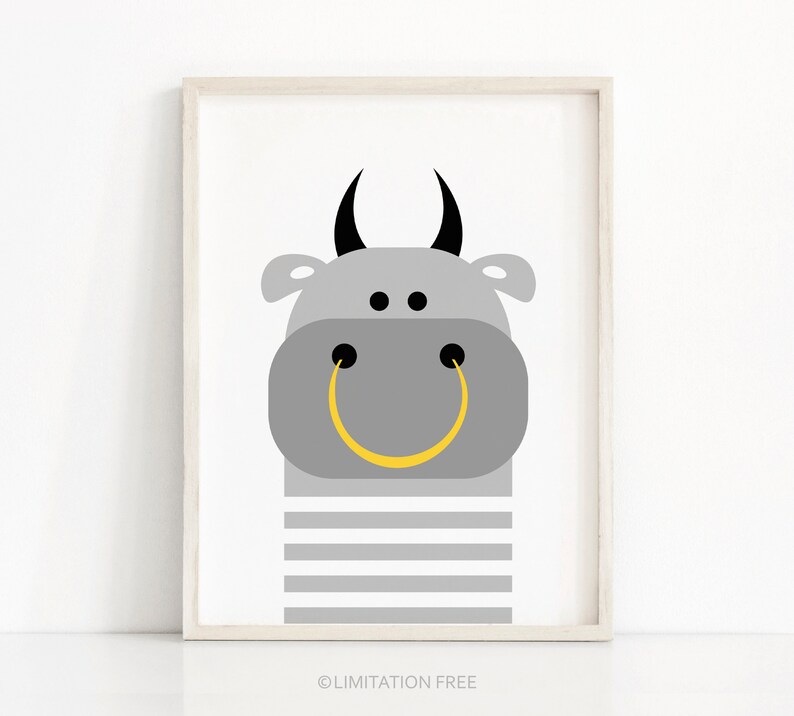 May include: A gray bull with black horns and a yellow ring for a mouth, with gray and white stripes on the bottom half of the body.