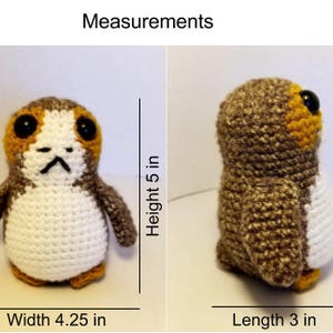May include: A crocheted stuffed toy resembling a bird with brown, white, and orange colours. It measures 5 inches tall, 4.25 inches wide, and 3 inches long.