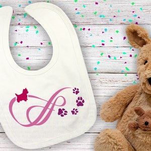 May include: White baby bib with a pink infinity symbol and paw prints. A small red dog silhouette is on top of the infinity symbol.