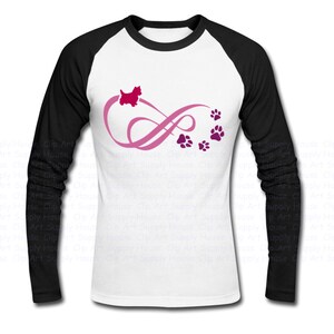 May include: A white and black baseball t-shirt with a pink infinity symbol and a red silhouette of a dog. The infinity symbol is decorated with paw prints.