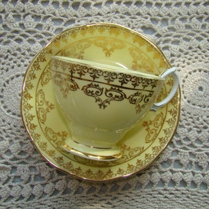 Royal Albert - Bone China England - Vintage Tea Cup and Saucer - Yellow with Gold Design and Trim