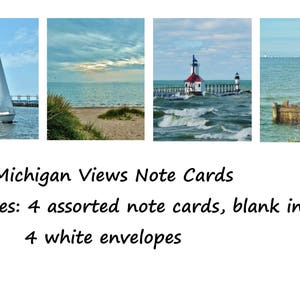 May include: Set of four Lake Michigan Views note cards featuring a sailboat, a lighthouse, a beach scene, and a view of the lake. The cards are blank inside and include four white envelopes.