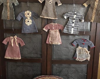 Primitive 7 1/2 “ Little Dresses on Wire Hangers. Customer Choice