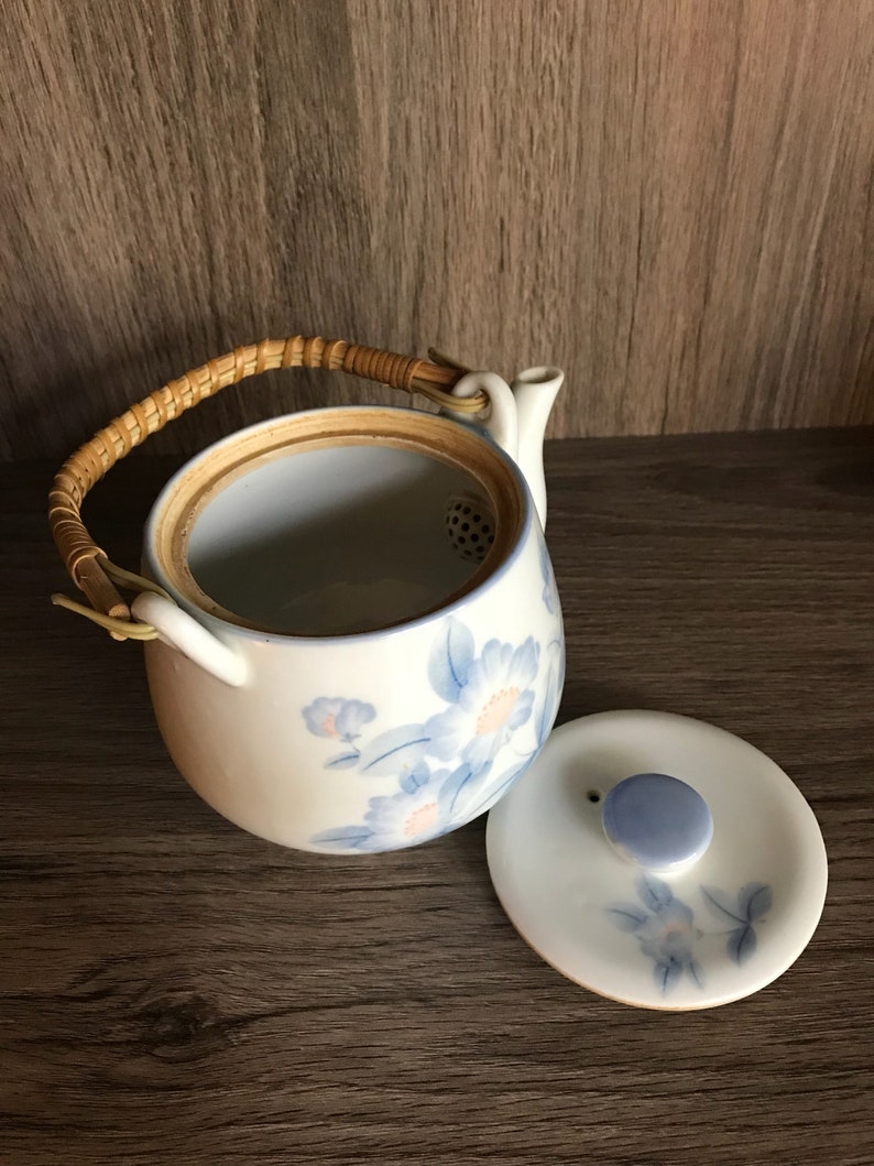 Blue flowersfloral design Vintage Asian White and Blue Teapot Ceramic Wrapped handle holds a little over 20 oz