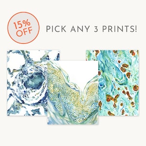 May include: Three watercolor prints with abstract designs in shades of blue, green, and yellow. The prints are displayed against a white background. Text in the image reads "15% OFF PICK ANY 3 PRINTS!"