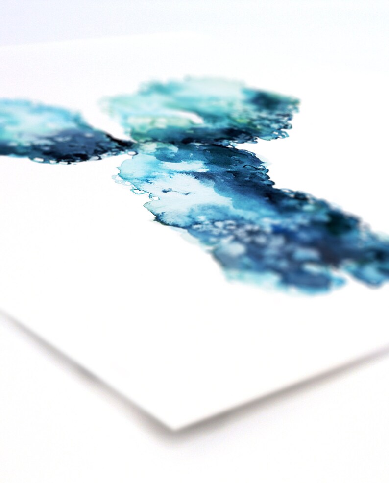 May include: Abstract watercolor painting with blue and green hues. The paint is splattered and layered, creating a unique and organic design.