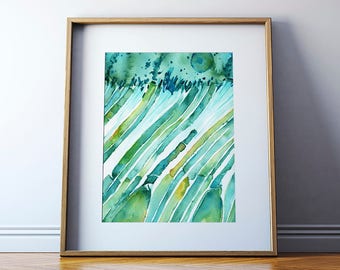 May include: Abstract watercolor painting with green and blue stripes on a white background. The painting is framed in a light wood frame.