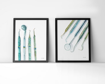 May include: Two framed watercolour illustrations of dental tools. The first frame shows five tools, including a mirror, a probe, and a scaler. The second frame shows six tools, including a mirror, a probe, and a scaler.