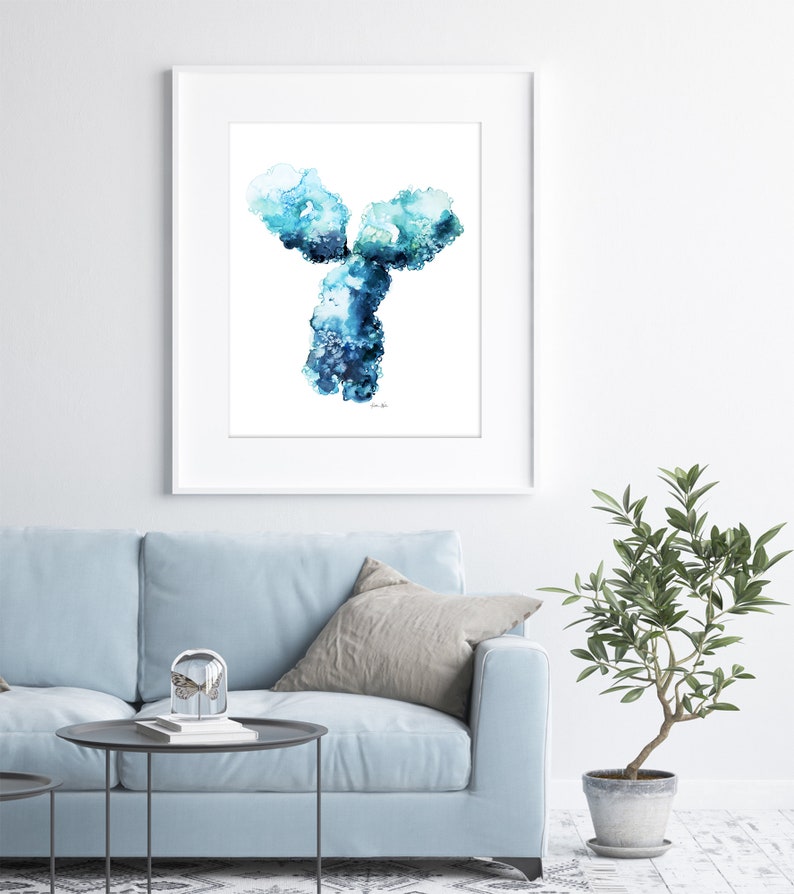 May include: A framed watercolor painting of a blue and green Y-shaped abstract design. The painting is on a white background and is framed in a white frame.