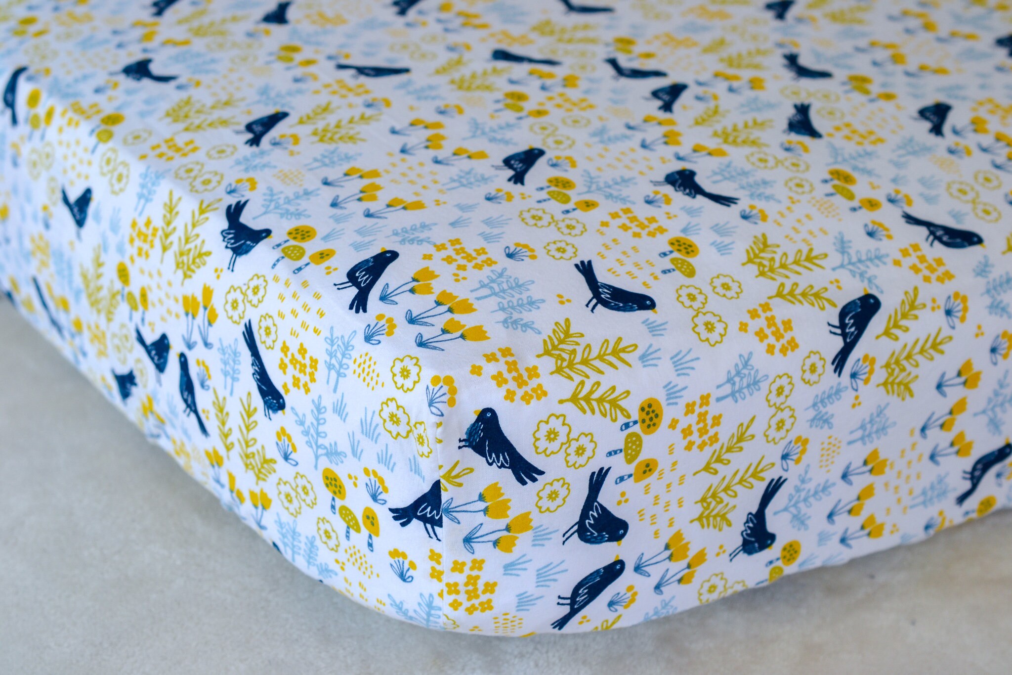 yellow floral crib sheet