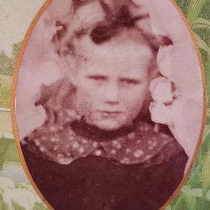 vintage green oval frame with very old photo and very rare piece