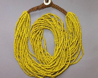 Naga Necklace with 18 Strands Small Yellow Glass Beads