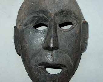 アンティークのグルン族の堅木製民族マスク、ネパールの部族芸術