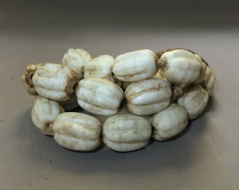 Strand with Oval Melon Shaped Shell Beads from Nepal