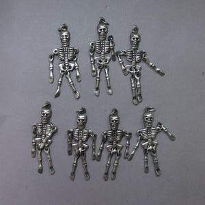 Seven Metal Skeleton Pendants from Nepal, Folk Jewelry, FREE SHIPPING