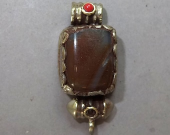 Metal Mounted Handmade Carnelian Pendant from Nepal, Folk Jewelry