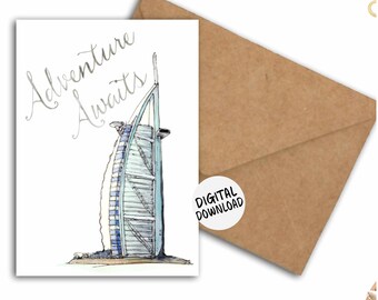 May include: A digital download of a printable card featuring a hand-drawn illustration of the Burj Al Arab hotel in Dubai. The card has the text "Adventure Awaits" written in cursive.