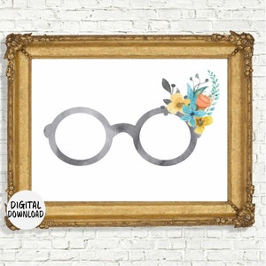 printable wall art of round eyeglasses frames in grey and a bouquet of yellow and turquoise flowers in the right top corner of the glasses