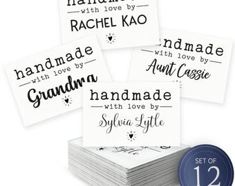 May include: A set of three ceramic mugs with a speckled, matte finish. The mugs are in shades of cream, light gray, and dark gray. Each mug has a simple, minimalist design and a rounded handle.