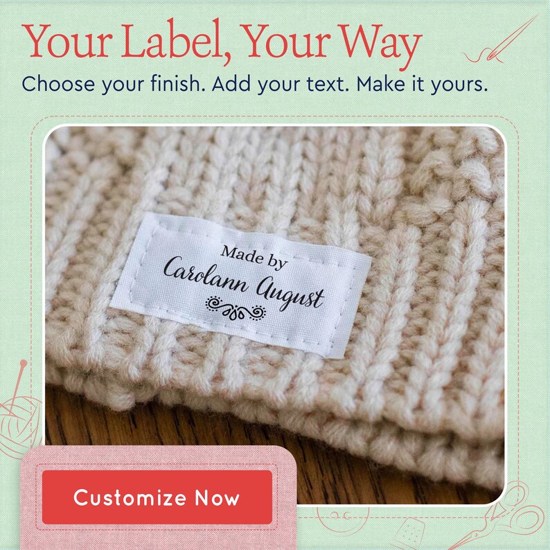 May include: A white rectangular fabric label sewn onto a beige knitted garment. The label features the black printed text "Made by Carolann August" with a decorative flourish underneath. The image includes the text "Your Label, Your Way" and "Customize Now".