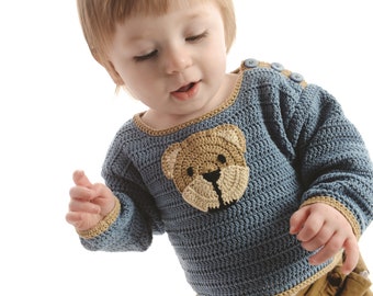 May include: A blue crocheted sweater with a brown bear applique on the front. The sweater has a yellow trim and blue buttons on the shoulders.