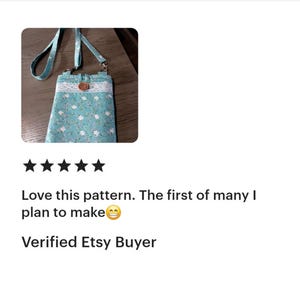 May include: A small, light blue floral print crossbody bag with white lace trim and a wooden button closure. The bag has a matching blue strap. The text "Love this pattern. The first of many I plan to make" is visible.