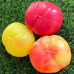 Three Ripening Plastic Beef Tomatoes