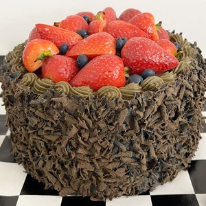 Vintage Faux Chocolate Cake with Strawberry and Blueberry Topping