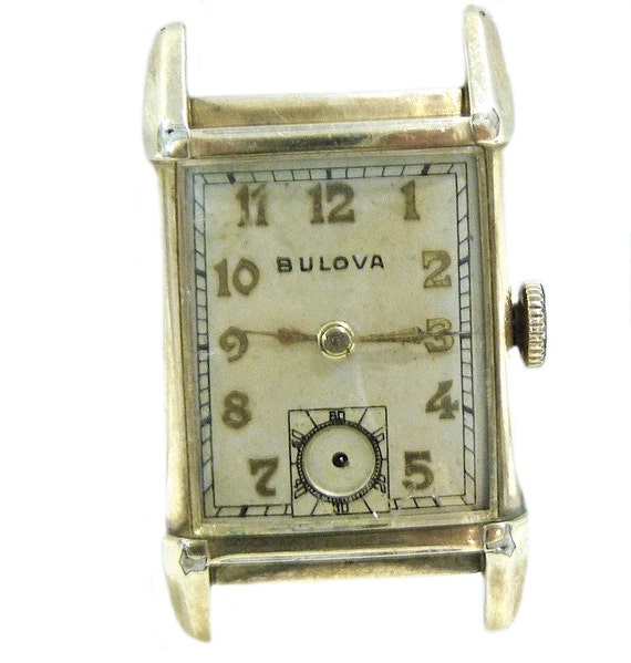 Bulova vintage 10K Gold Filled rettangolare caso anse fantasia | Etsy Italia