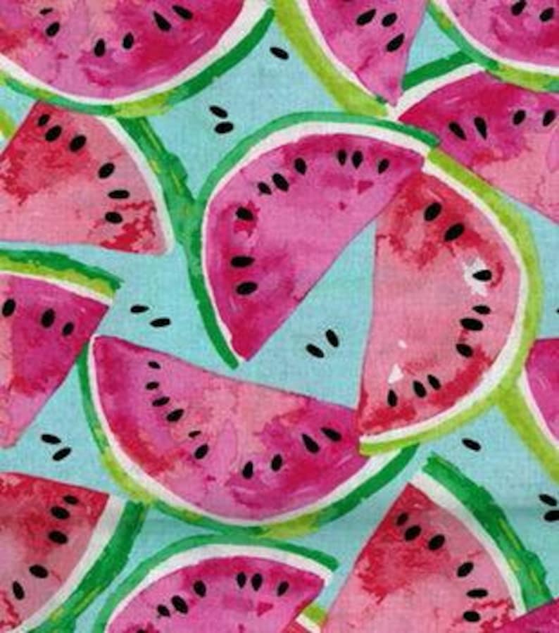 May include: A repeating pattern of pink watermelon slices on a light blue background. The watermelon slices have black seeds and green rinds.
