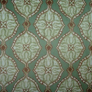 May include: A repeating pattern featuring an ornate design in shades of green, brown, and cream. The pattern consists of stylized, symmetrical shapes with floral-like details, creating a textured, decorative surface.