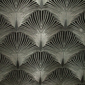 May include: A black fabric with a silver metallic pattern of repeating fan shapes.